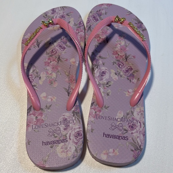 New Havaianas
× LoveShackFancy Slim
Happy Thoughts Flip Flop in glow pink - Picture 1 of 15